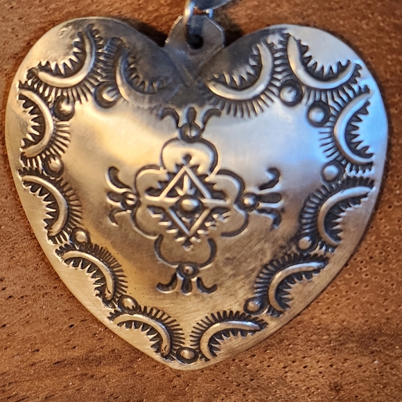 Navajo Vincent Joe Platero, Sterling Silver Stamped Heart Earrings - Picture 4 of 14